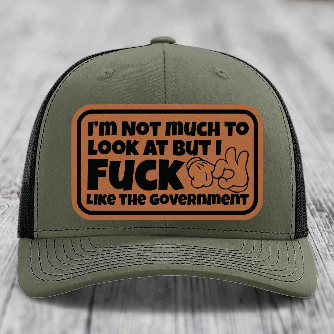 Im Not Much To Look At, But I F*ck Like The Government - Leather Patch Hat - Rawhide to Black Patch - Richardson 112 Snapback Trucker Hat