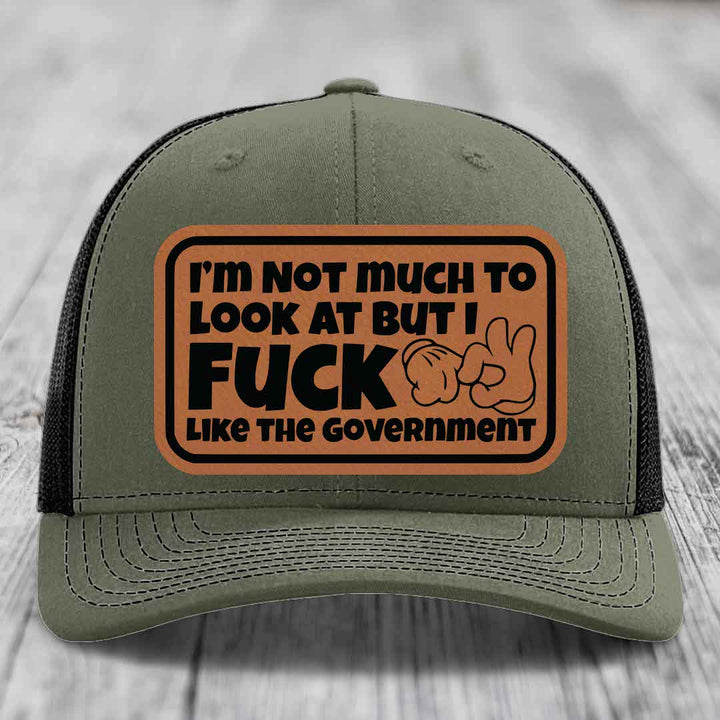 Im Not Much To Look At, But I F*ck Like The Government - Leather Patch Hat - Rawhide to Black Patch - Richardson 112 Snapback Trucker Hat