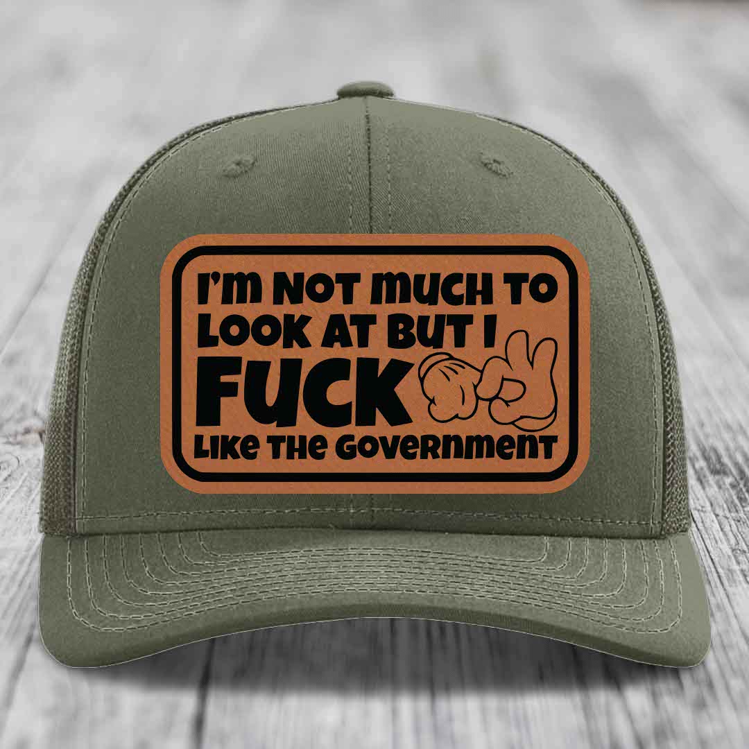 Im Not Much To Look At, But I F*ck Like The Government - Leather Patch Hat - Rawhide to Black Patch - Richardson 112 Snapback Trucker Hat