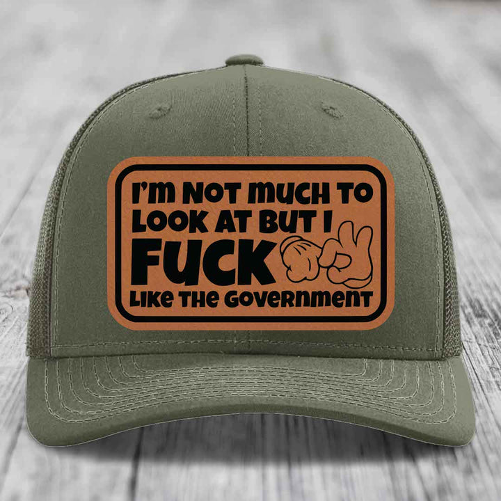 Im Not Much To Look At, But I F*ck Like The Government - Leather Patch Hat - Rawhide to Black Patch - Richardson 112 Snapback Trucker Hat