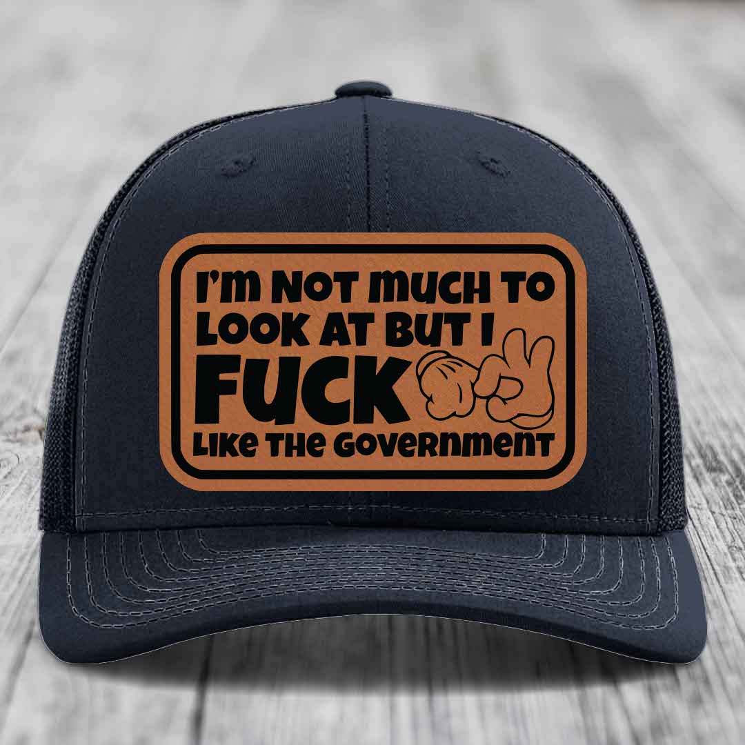 Im Not Much To Look At, But I F*ck Like The Government - Leather Patch Hat - Rawhide to Black Patch - Richardson 112 Snapback Trucker Hat