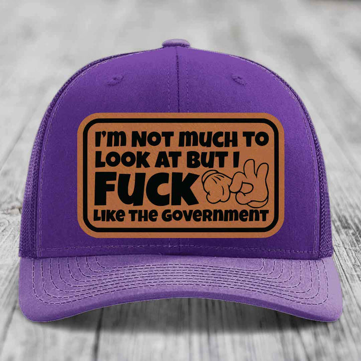 Im Not Much To Look At, But I F*ck Like The Government - Leather Patch Hat - Rawhide to Black Patch - Richardson 112 Snapback Trucker Hat