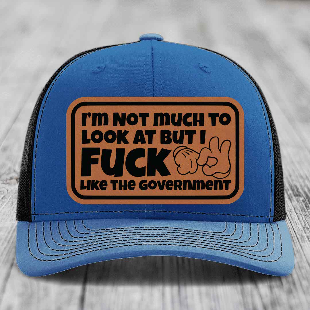 Im Not Much To Look At, But I F*ck Like The Government - Leather Patch Hat - Rawhide to Black Patch - Richardson 112 Snapback Trucker Hat