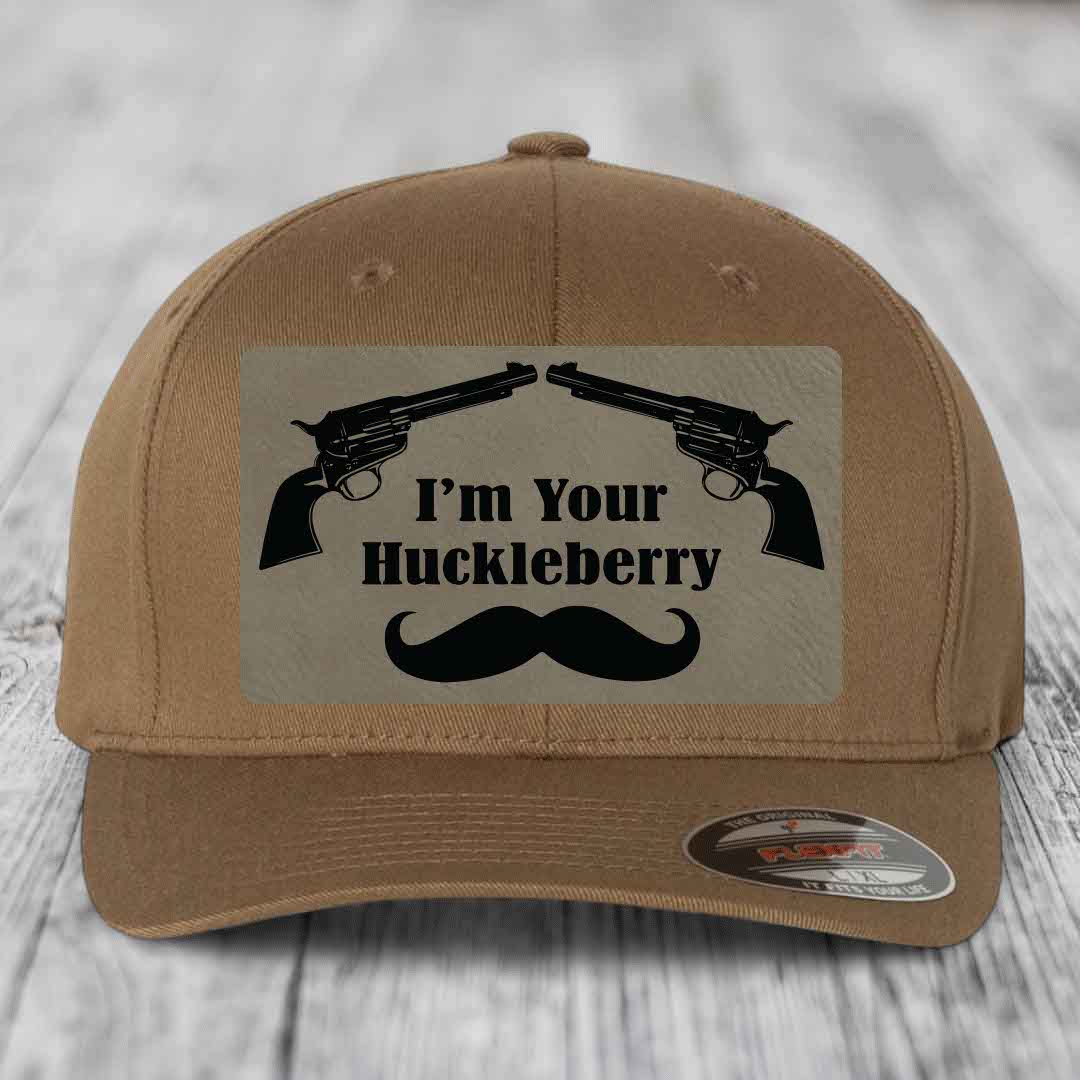 Tan baseball cap with black &