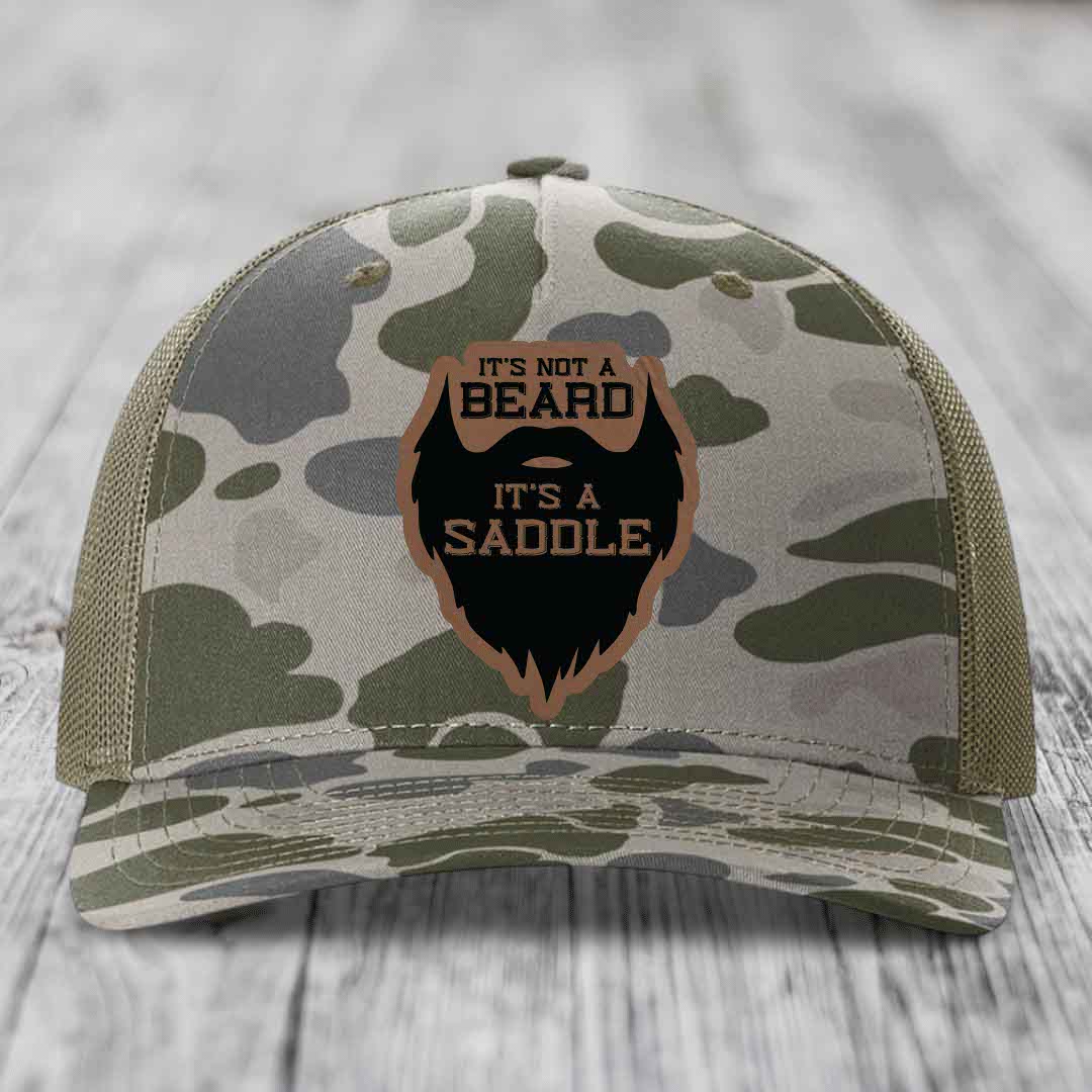 Its Not A Beard, Its A Saddle - Leather Patch Hat - Dark Brown to Black Patch - Richardson 112PFP Snapback Trucker Hat