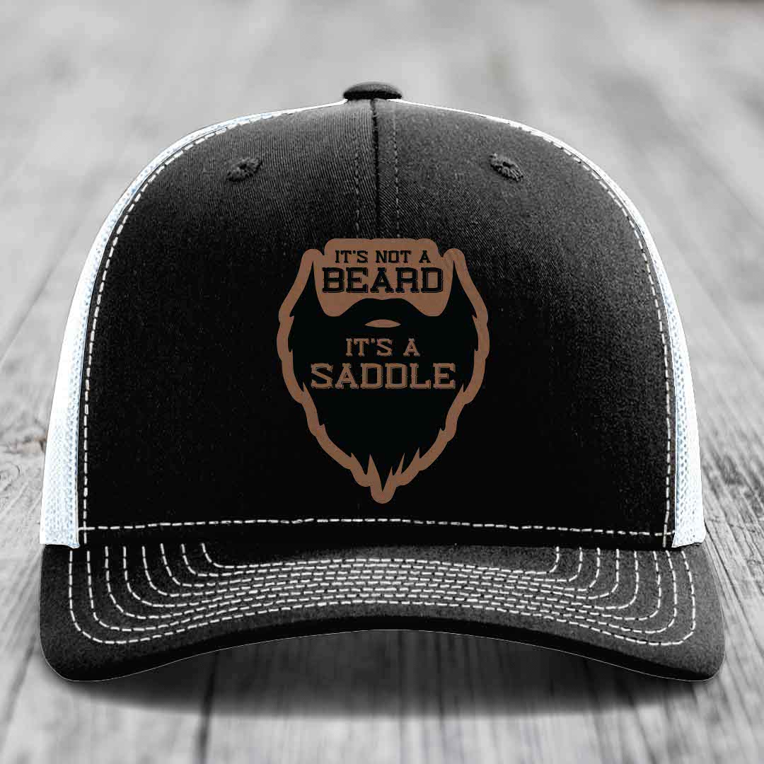 Its Not A Beard, Its A Saddle - Leather Patch Hat - Dark Brown to Black Patch - Richardson 112 Snapback Trucker Hat