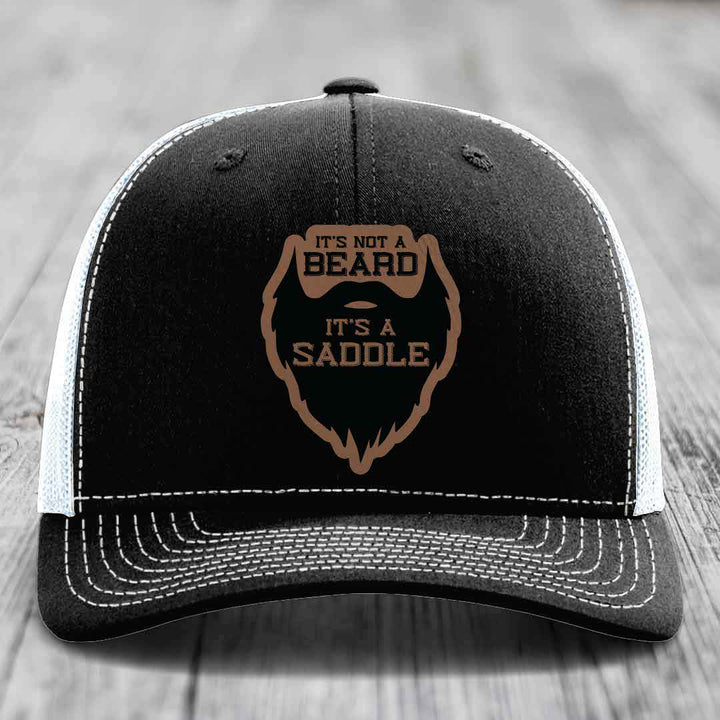 Its Not A Beard, Its A Saddle - Leather Patch Hat - Dark Brown to Black Patch - Richardson 112 Snapback Trucker Hat