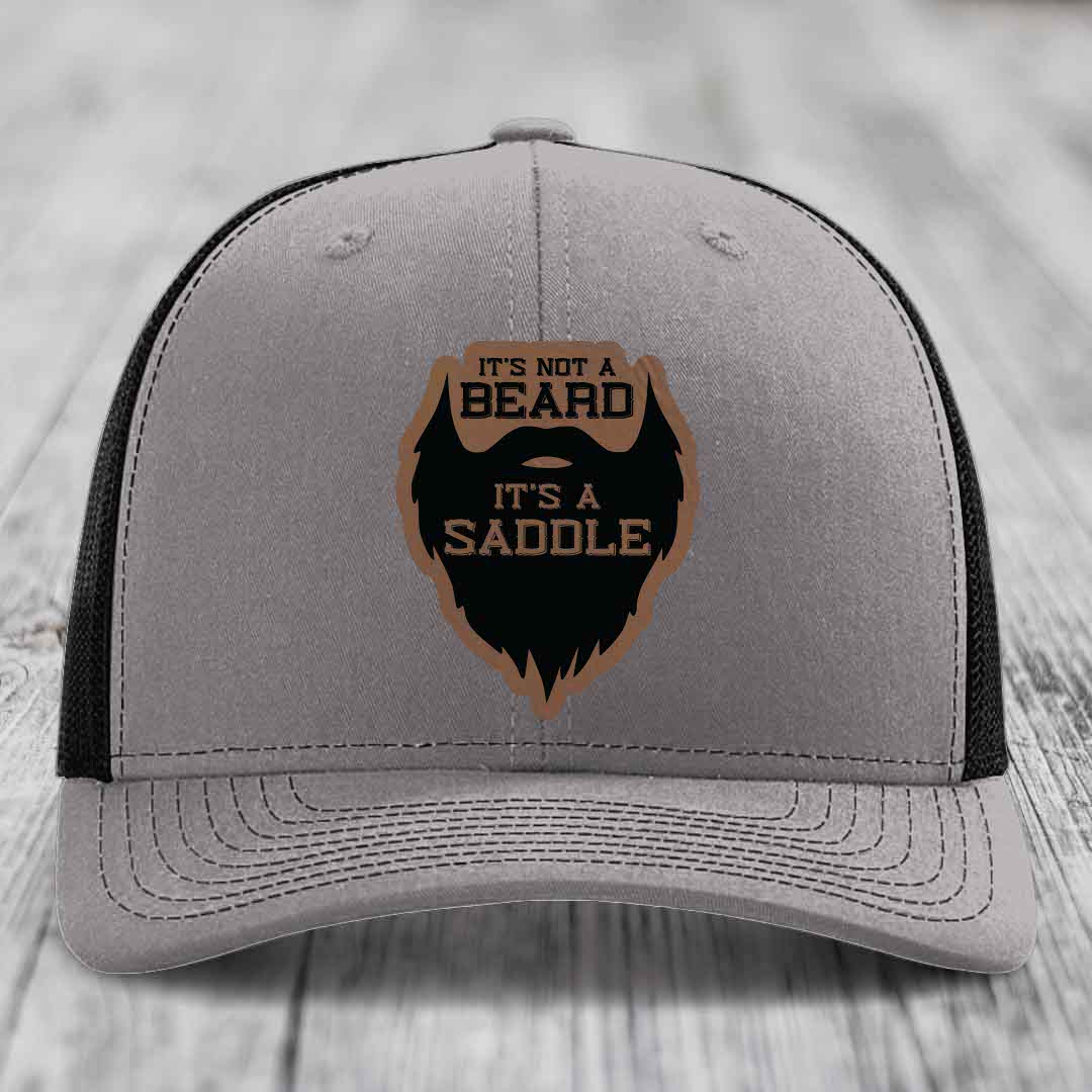 Its Not A Beard, Its A Saddle - Leather Patch Hat - Dark Brown to Black Patch - Richardson 112 Snapback Trucker Hat