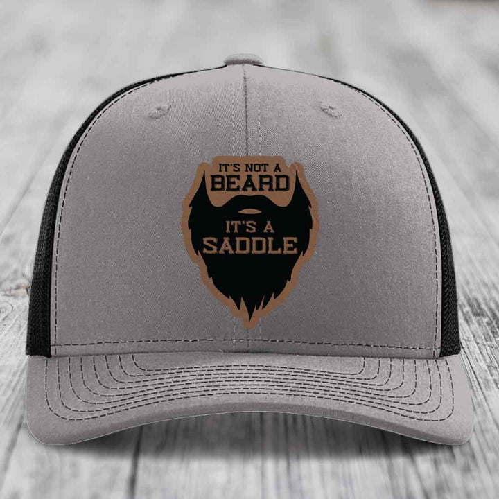 Its Not A Beard, Its A Saddle - Leather Patch Hat - Dark Brown to Black Patch - Richardson 112 Snapback Trucker Hat