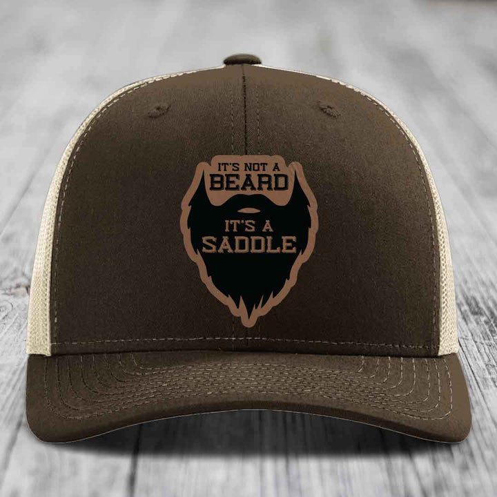 Its Not A Beard, Its A Saddle - Leather Patch Hat - Dark Brown to Black Patch - Richardson 112 Snapback Trucker Hat