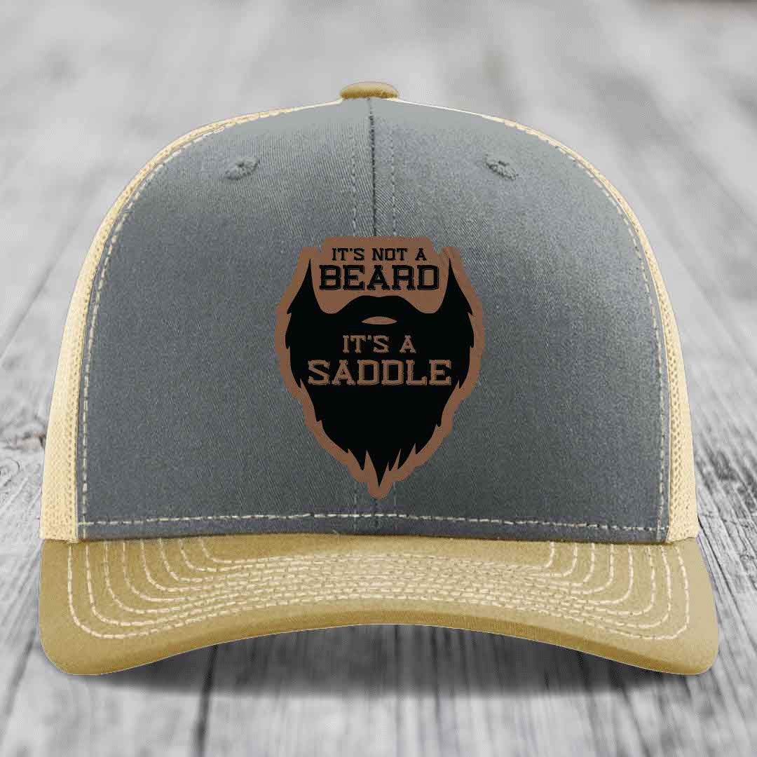 Its Not A Beard, Its A Saddle - Leather Patch Hat - Dark Brown to Black Patch - Richardson 112 Snapback Trucker Hat