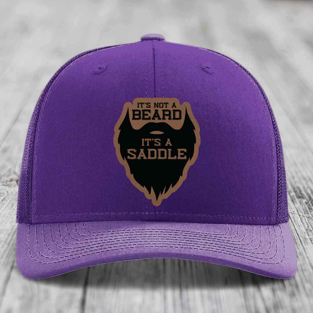 Its Not A Beard, Its A Saddle - Leather Patch Hat - Dark Brown to Black Patch - Richardson 112 Snapback Trucker Hat