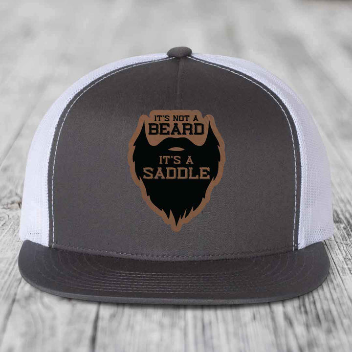 Its Not A Beard, Its A Saddle - Leather Patch Hat - Dark Brown to Black Patch - Yupoong 6006 Snapback Flatbill Hat