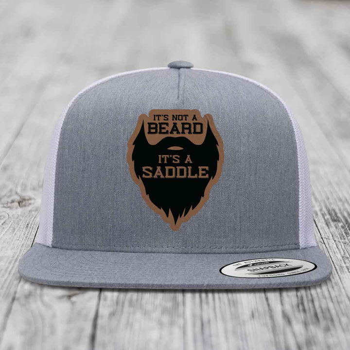 Its Not A Beard, Its A Saddle - Leather Patch Hat - Dark Brown to Black Patch - Yupoong 6006 Snapback Flatbill Hat