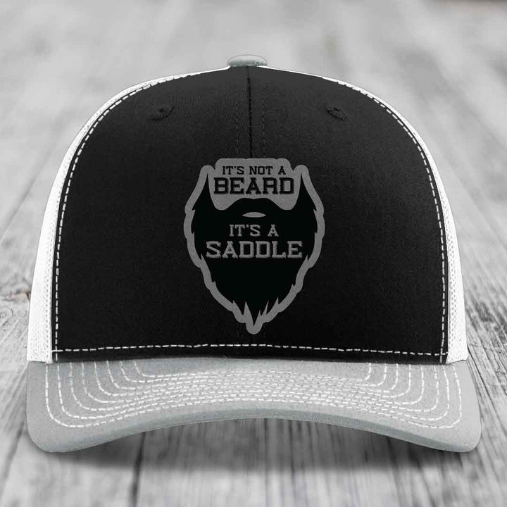 Its Not A Beard, Its A Saddle - Leather Patch Hat - Grey to Black Patch - Richardson 112 Snapback Trucker Hat