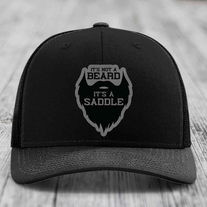 Its Not A Beard, Its A Saddle - Leather Patch Hat - Grey to Black Patch - Richardson 112 Snapback Trucker Hat