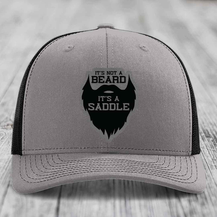 Its Not A Beard, Its A Saddle - Leather Patch Hat - Grey to Black Patch - Richardson 112 Snapback Trucker Hat