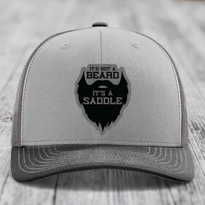 Its Not A Beard, Its A Saddle - Leather Patch Hat - Grey to Black Patch - Richardson 112 Snapback Trucker Hat