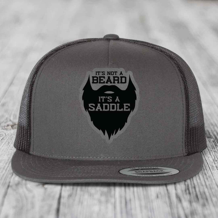 Its Not A Beard, Its A Saddle - Leather Patch Hat - Grey to Black Patch - Yupoong 6006 Snapback Flatbill Hat