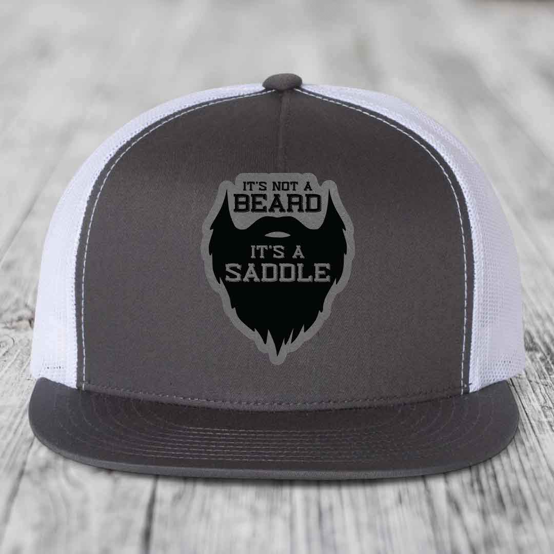 Its Not A Beard, Its A Saddle - Leather Patch Hat - Grey to Black Patch - Yupoong 6006 Snapback Flatbill Hat