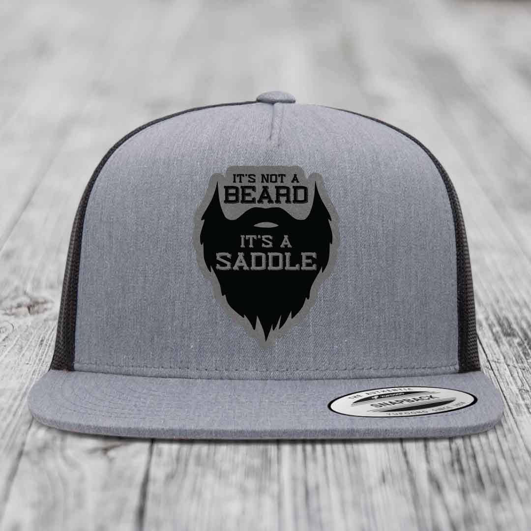 Its Not A Beard, Its A Saddle - Leather Patch Hat - Grey to Black Patch - Yupoong 6006 Snapback Flatbill Hat