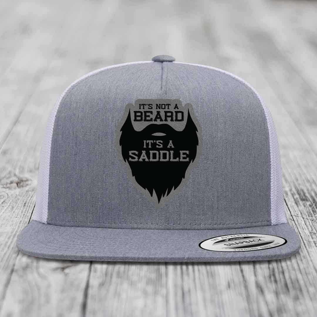 Its Not A Beard, Its A Saddle - Leather Patch Hat - Grey to Black Patch - Yupoong 6006 Snapback Flatbill Hat