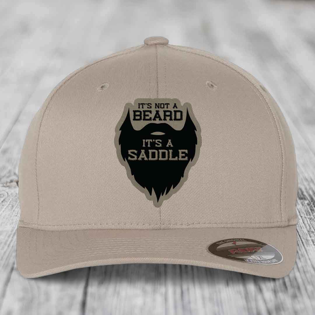 Its Not A Beard, Its A Saddle - Leather Patch Hat - Light Brown to Black Patch - Flexfit 6277 Fitted Hat