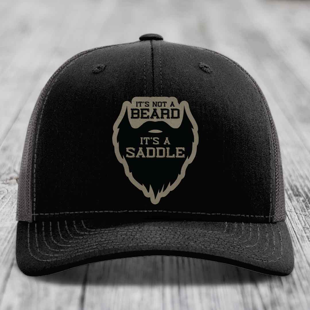 Its Not A Beard, Its A Saddle - Leather Patch Hat - Light Brown to Black Patch - Richardson 112 Snapback Trucker Hat