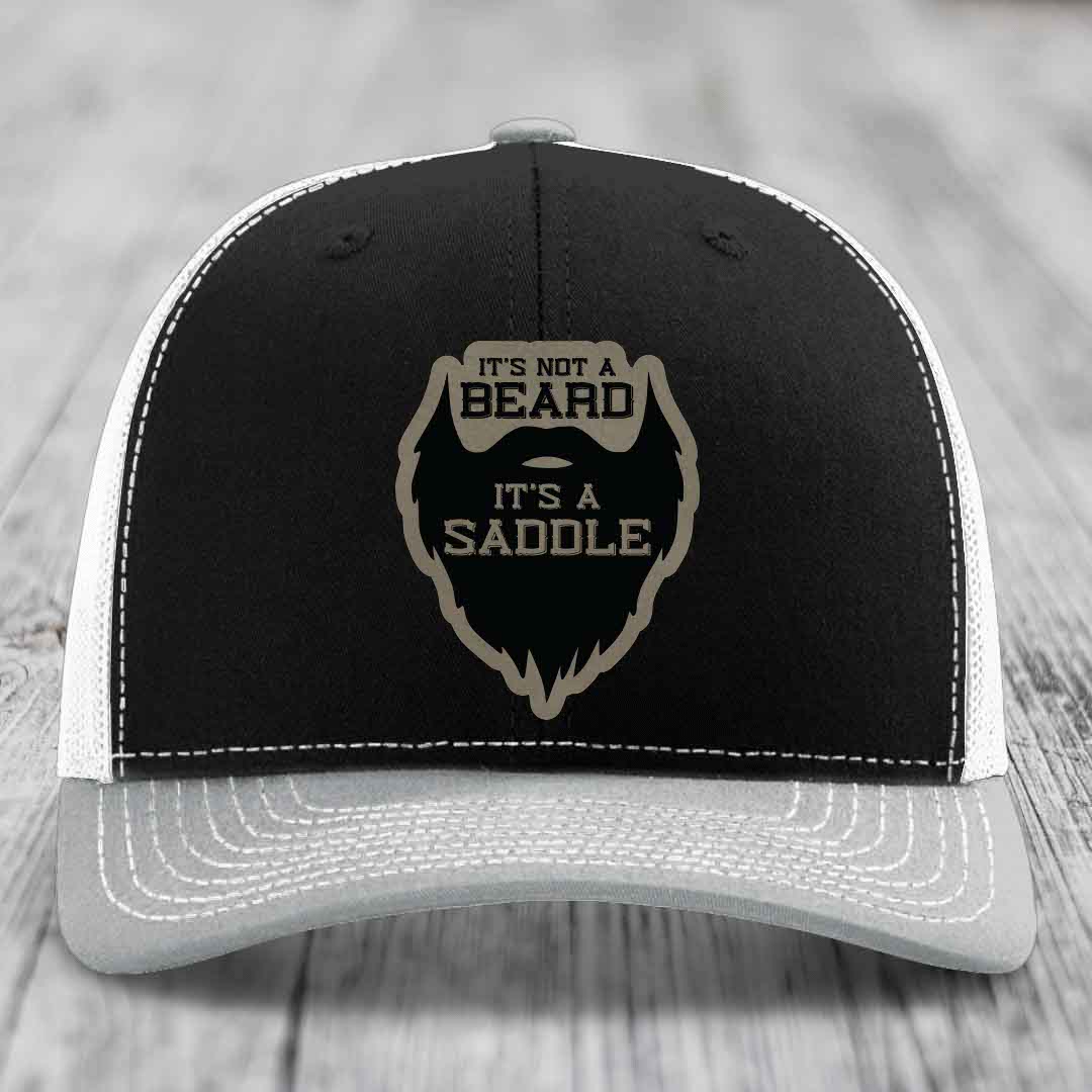 Its Not A Beard, Its A Saddle - Leather Patch Hat - Light Brown to Black Patch - Richardson 112 Snapback Trucker Hat