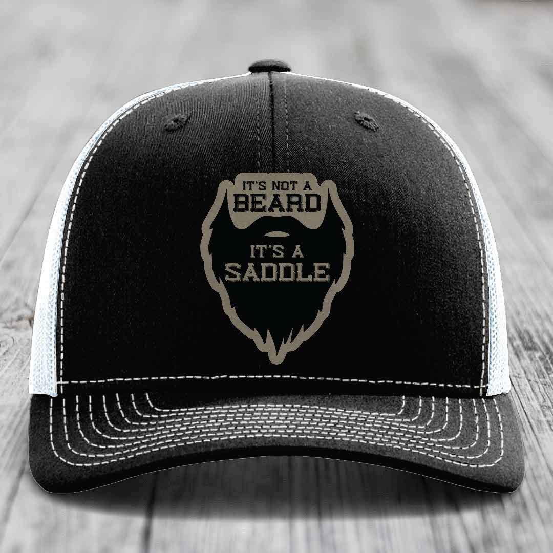 Its Not A Beard, Its A Saddle - Leather Patch Hat - Light Brown to Black Patch - Richardson 112 Snapback Trucker Hat