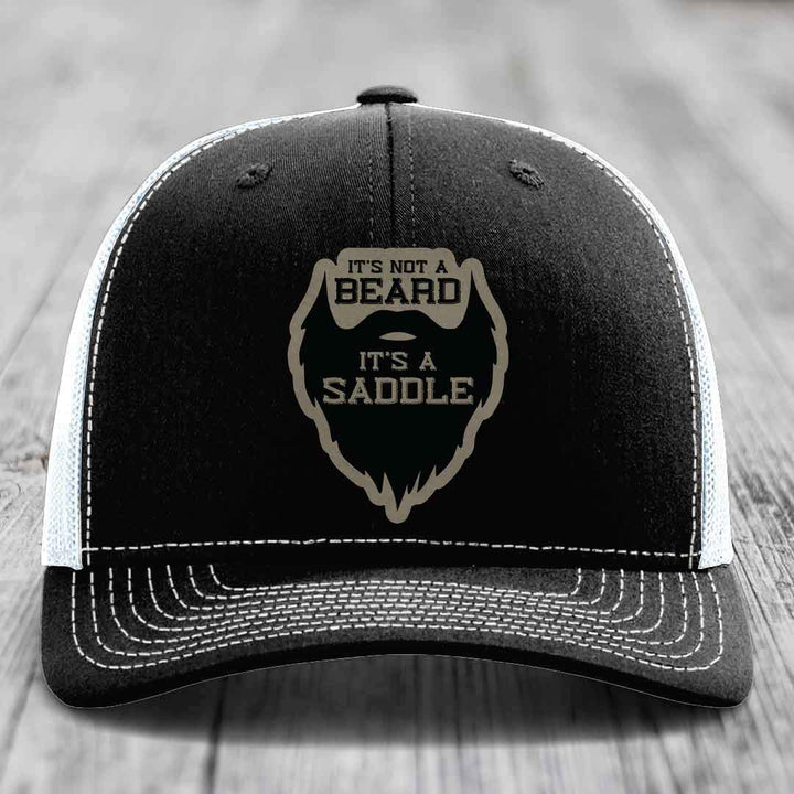 Its Not A Beard, Its A Saddle - Leather Patch Hat - Light Brown to Black Patch - Richardson 112 Snapback Trucker Hat