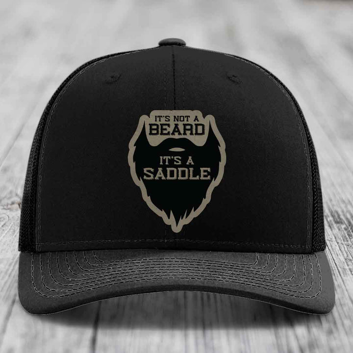 Its Not A Beard, Its A Saddle - Leather Patch Hat - Light Brown to Black Patch - Richardson 112 Snapback Trucker Hat