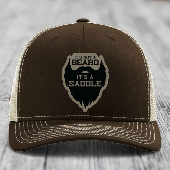 Its Not A Beard, Its A Saddle - Leather Patch Hat - Light Brown to Black Patch - Richardson 112 Snapback Trucker Hat