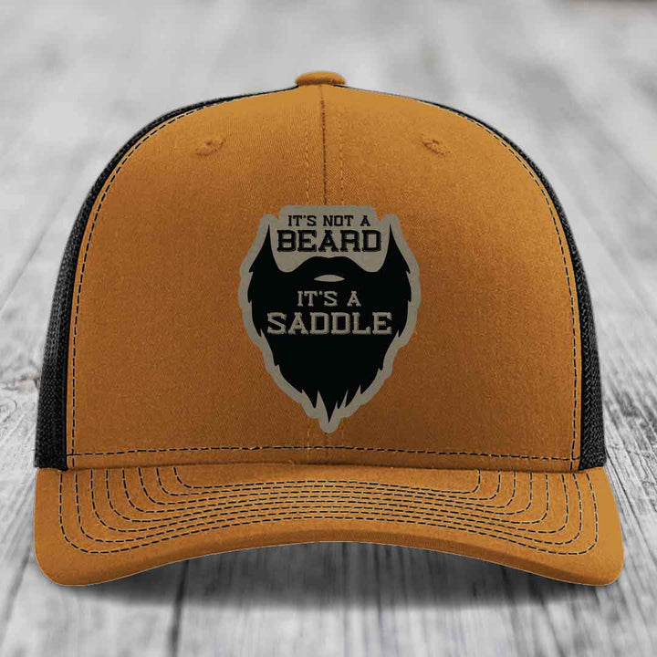 Its Not A Beard, Its A Saddle - Leather Patch Hat - Light Brown to Black Patch - Richardson 112 Snapback Trucker Hat