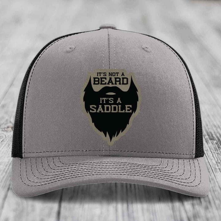 Its Not A Beard, Its A Saddle - Leather Patch Hat - Light Brown to Black Patch - Richardson 112 Snapback Trucker Hat