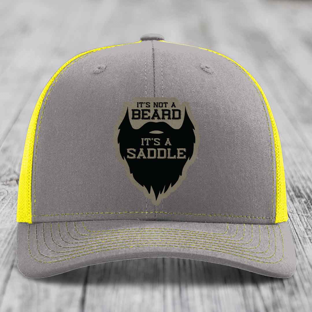 Its Not A Beard, Its A Saddle - Leather Patch Hat - Light Brown to Black Patch - Richardson 112 Snapback Trucker Hat