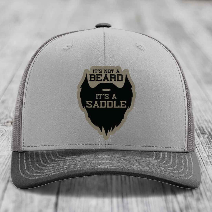 Its Not A Beard, Its A Saddle - Leather Patch Hat - Light Brown to Black Patch - Richardson 112 Snapback Trucker Hat