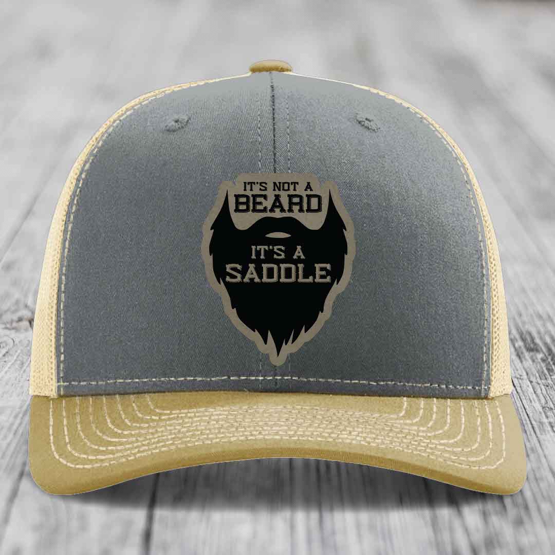 Its Not A Beard, Its A Saddle - Leather Patch Hat - Light Brown to Black Patch - Richardson 112 Snapback Trucker Hat