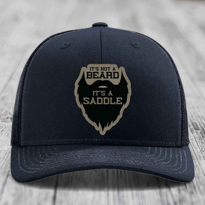 Its Not A Beard, Its A Saddle - Leather Patch Hat - Light Brown to Black Patch - Richardson 112 Snapback Trucker Hat
