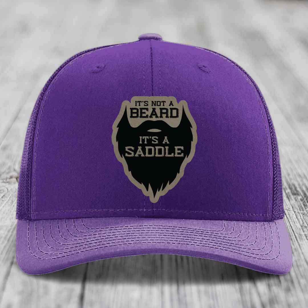 Its Not A Beard, Its A Saddle - Leather Patch Hat - Light Brown to Black Patch - Richardson 112 Snapback Trucker Hat