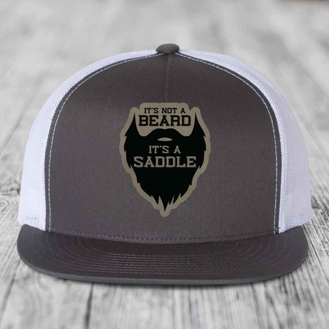 Its Not A Beard, Its A Saddle - Leather Patch Hat - Light Brown to Black Patch - Yupoong 6006 Snapback Flatbill Hat