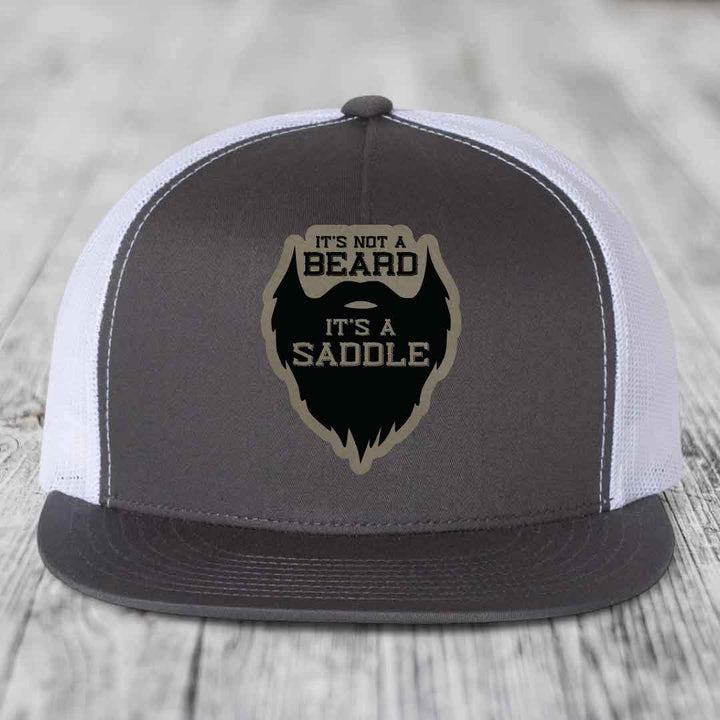 Its Not A Beard, Its A Saddle - Leather Patch Hat - Light Brown to Black Patch - Yupoong 6006 Snapback Flatbill Hat
