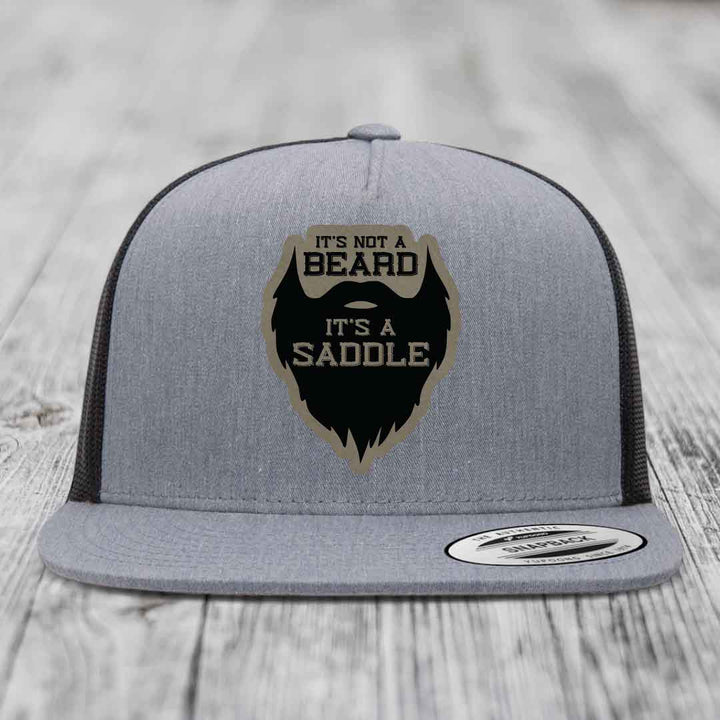Its Not A Beard, Its A Saddle - Leather Patch Hat - Light Brown to Black Patch - Yupoong 6006 Snapback Flatbill Hat