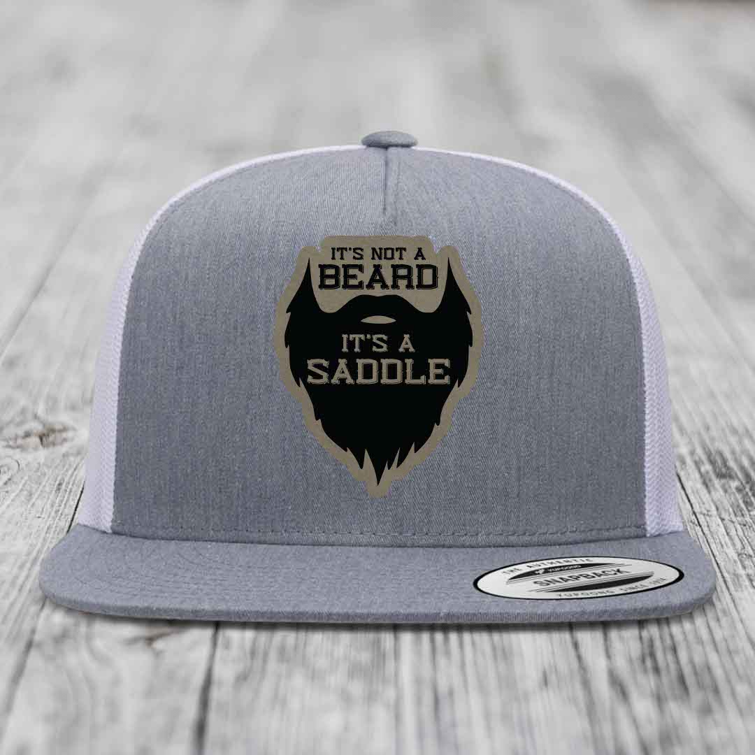 Its Not A Beard, Its A Saddle - Leather Patch Hat - Light Brown to Black Patch - Yupoong 6006 Snapback Flatbill Hat