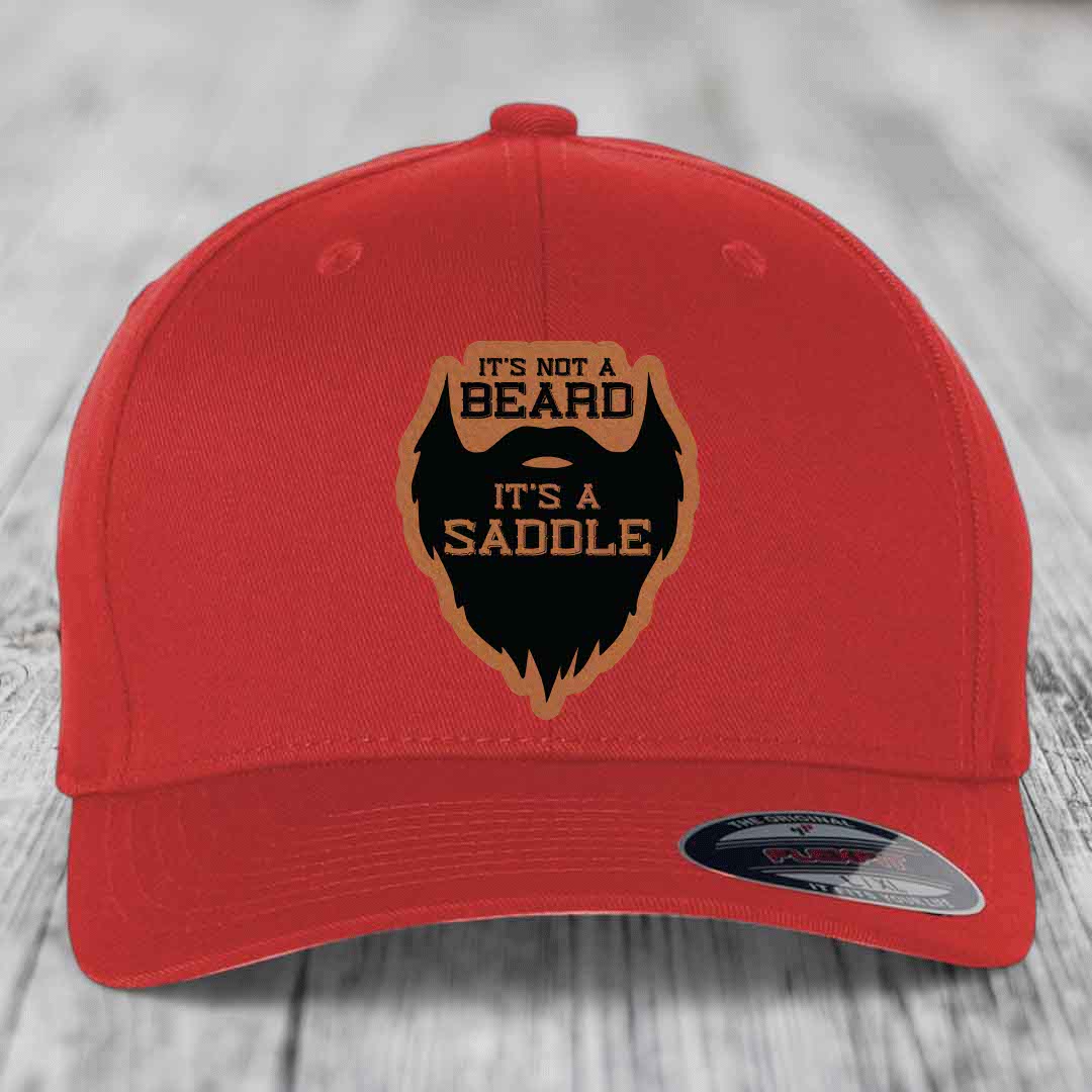 Its Not A Beard, Its A Saddle - Leather Patch Hat - Rawhide to Black Patch - Flexfit 6277 Fitted Hat