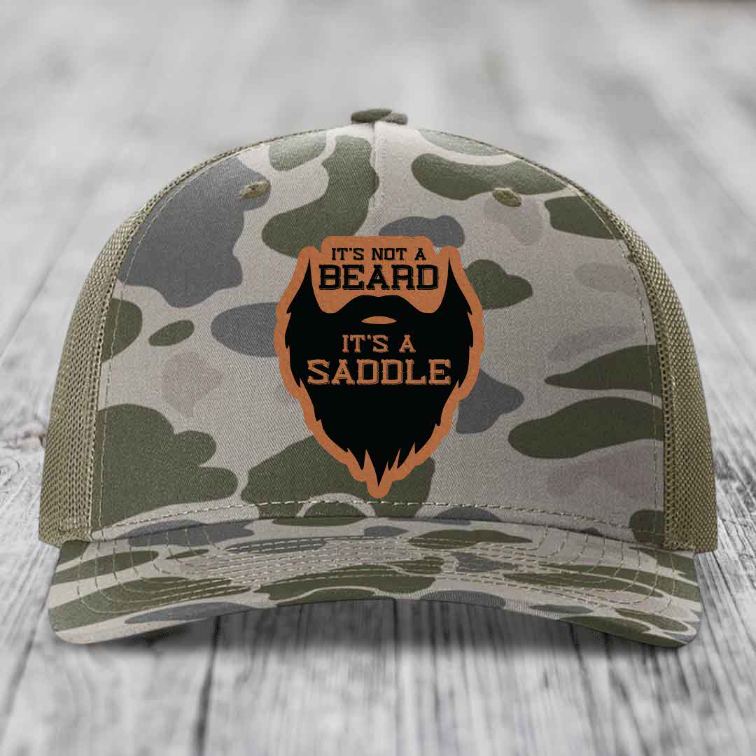 Its Not A Beard, Its A Saddle - Leather Patch Hat - Rawhide to Black Patch - Richardson 112PFP Snapback Trucker Hat