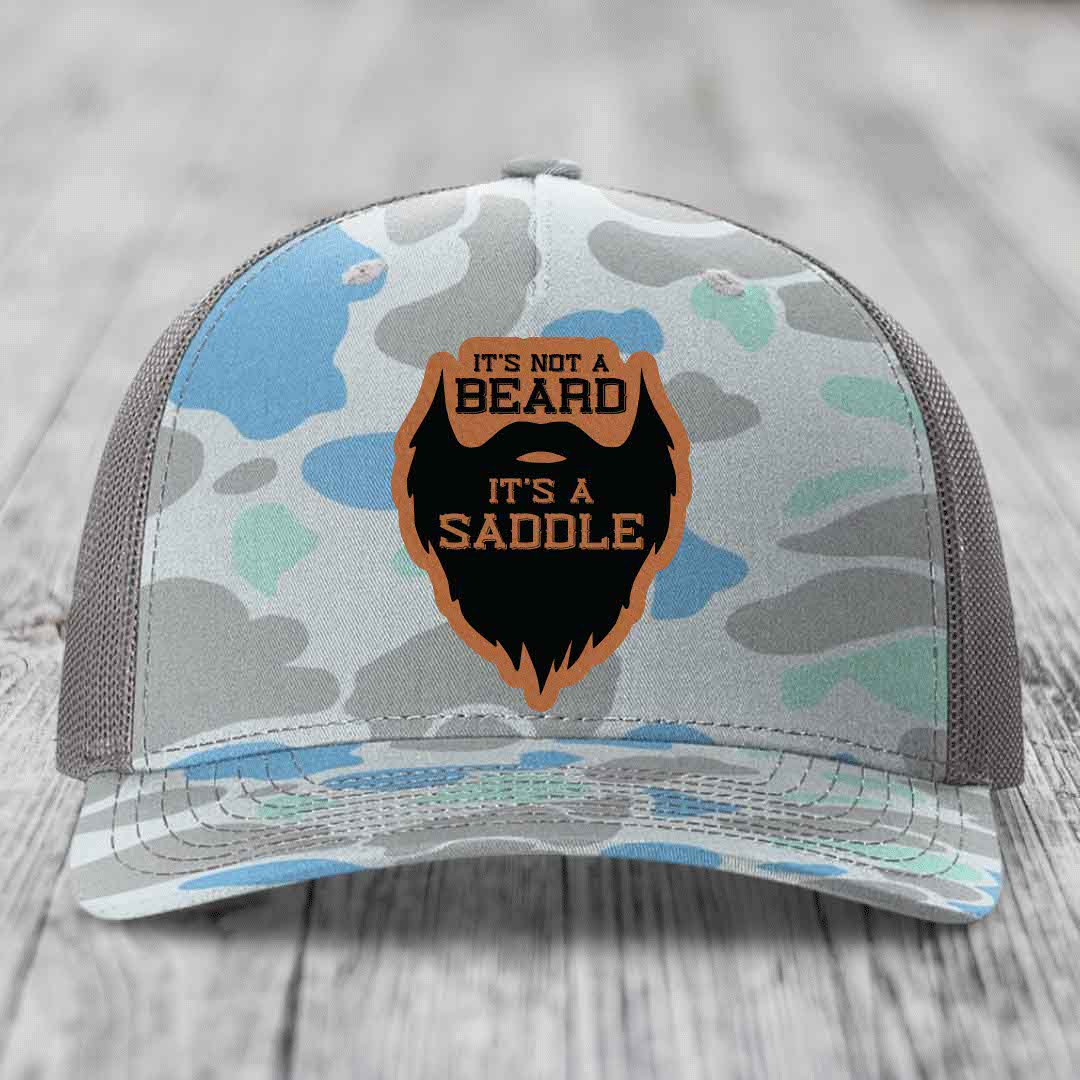 Its Not A Beard, Its A Saddle - Leather Patch Hat - Rawhide to Black Patch - Richardson 112PFP Snapback Trucker Hat