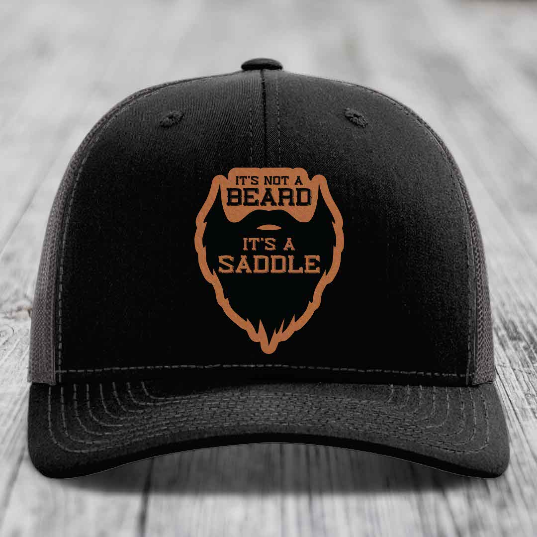 Its Not A Beard, Its A Saddle - Leather Patch Hat - Rawhide to Black Patch - Richardson 112 Snapback Trucker Hat