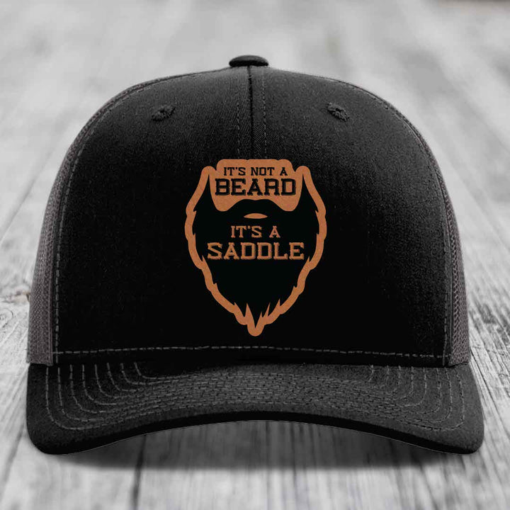 Its Not A Beard, Its A Saddle - Leather Patch Hat - Rawhide to Black Patch - Richardson 112 Snapback Trucker Hat