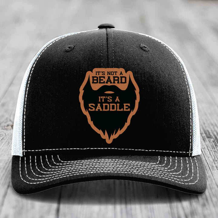 Its Not A Beard, Its A Saddle - Leather Patch Hat - Rawhide to Black Patch - Richardson 112 Snapback Trucker Hat